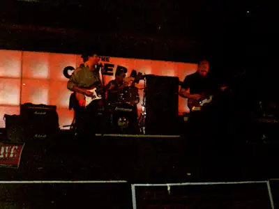 Peter Jorgensen, Johnny Rainford, and Bill Butterworth, playing live at the Cavern as Devils River Devils River live on the Beatles stage at the Cavern Club
