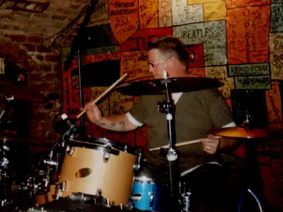 Bill Butterworth playing drums on the Beatles Stage Bill Butterworth playing drums for Devils River on the Beatles stage