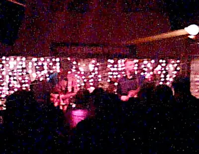 Devils River playing the Underground Club, Southport A view through the crowd to the band playing live on stage